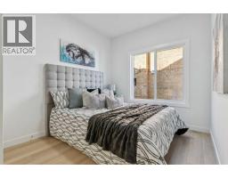 Bedroom - 105, 95 Saddlecrest Circle Ne, Calgary, AB T3J0Z2 Photo 9
