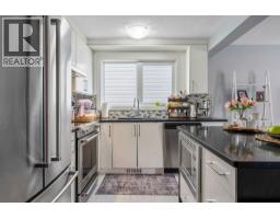 4pc Bathroom - 15 Woodmont Green Sw, Calgary, AB T2W4Z3 Photo 12