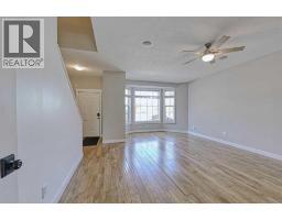 Den - 179 Rainbow Falls Drive, Chestermere, AB T1X0A7 Photo 11
