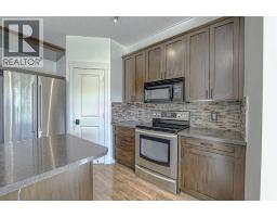 179 Rainbow Falls Drive, Chestermere, AB T1X0A7 Photo 17