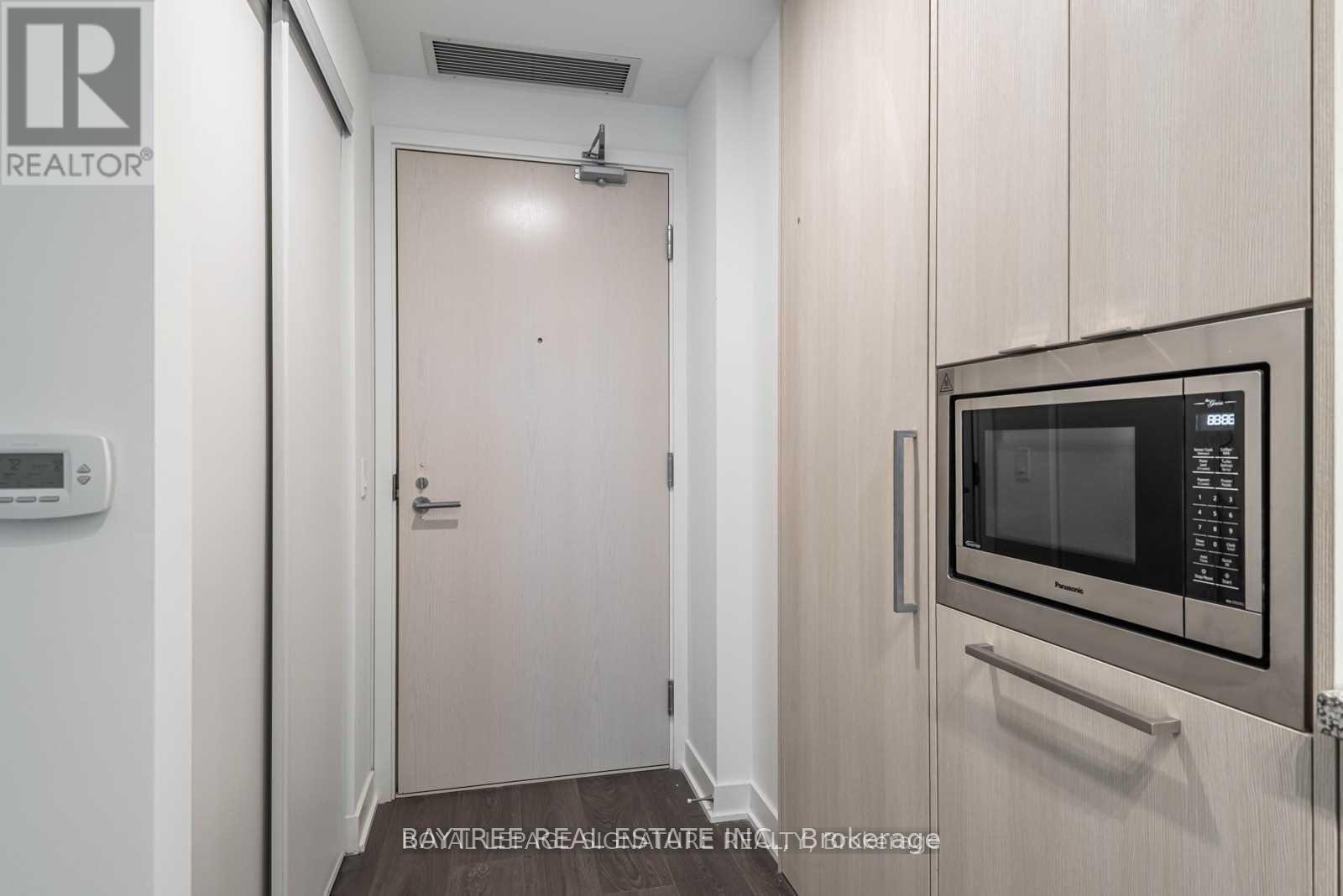 518 - 115 BLUE JAYS WAY, Toronto (Waterfront Communities) — photo 2