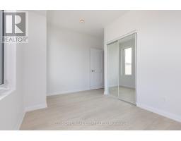 Th - 1 - 1010 Portage Parkway, Vaughan, ON L4K0K3 Photo 11