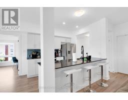 202 - 4 Spice Way, Barrie, ON L9J0M2 Photo 13