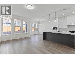Living room - 177 Copperhead Road Se, Calgary, AB T2Z5H7 Photo 6