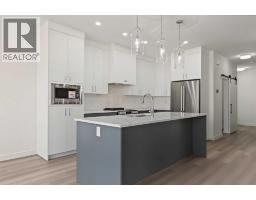 Laundry room - 177 Copperhead Road Se, Calgary, AB T2Z5H7 Photo 9