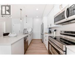 Laundry room - 4414, 550 Belmont Street Sw, Calgary, AB T2X5Y9 Photo 7