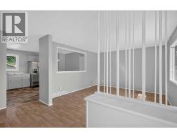 Family room - 7935 Huntwick Hill Ne, Calgary, AB T2K4G9 Photo 7