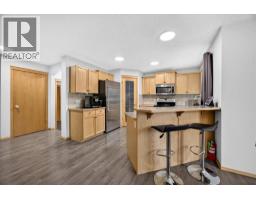 Family room - 2745 Coopers Manor Sw, Airdrie, AB T4B3J8 Photo 13