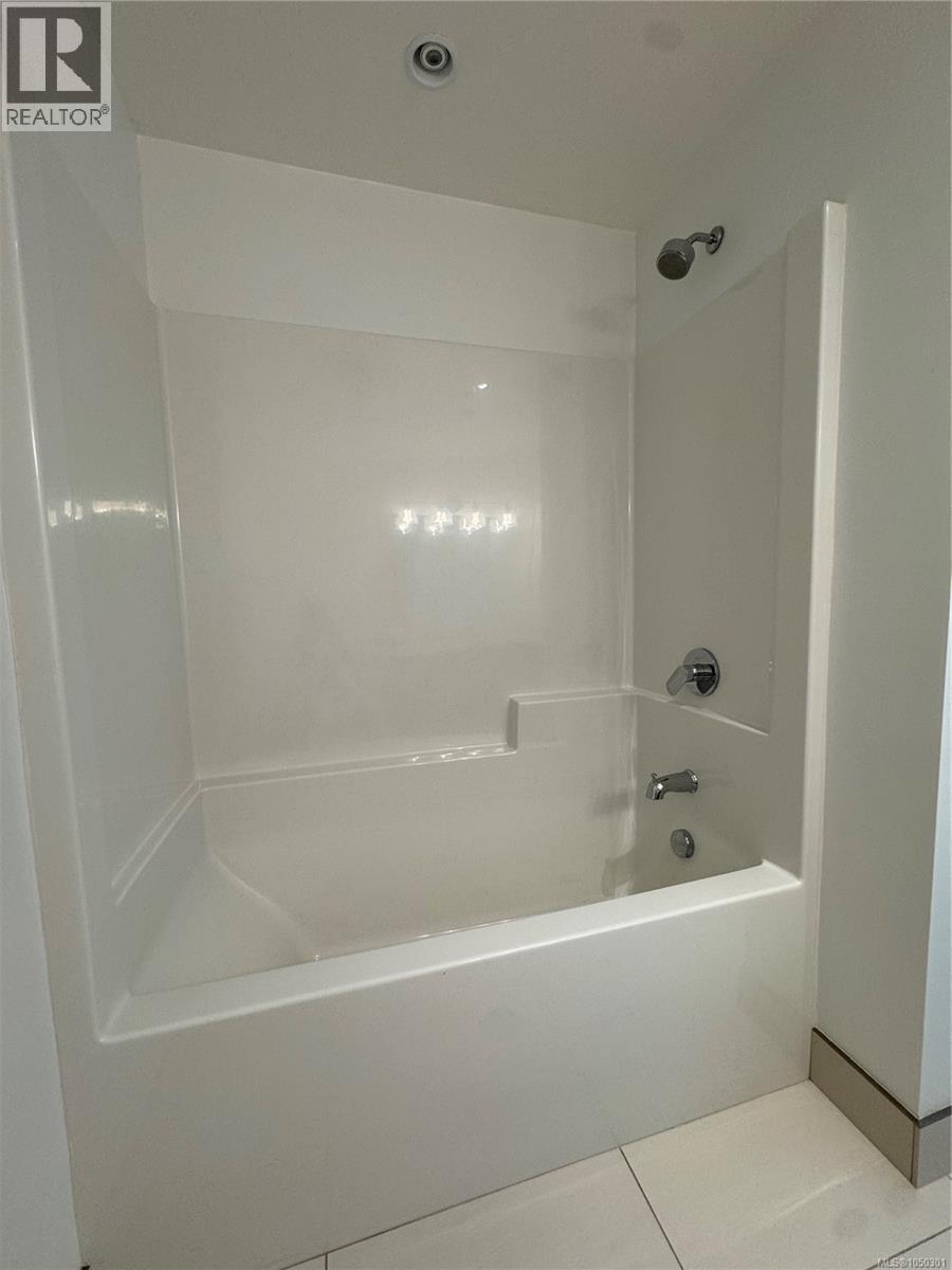 #303 300 Belmont Rd - 19