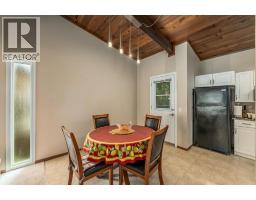 Bedroom - 125 Oaktree Lane Sw, Calgary, AB T2V4E3 Photo 6