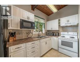 125 Oaktree Lane Sw, Calgary, AB T2V4E3 Photo 8