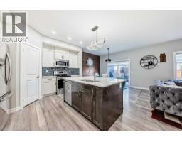 Laundry room - 199 Kinniburgh Road, Chestermere, AB T1X0T8 Photo 7