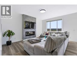 Living room - 123 Dawson Dock Cove, Chestermere, AB T1X2W9 Photo 6