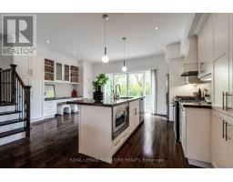 Family room - 18 Matthew Court, Toronto, ON M9B0C1 Photo 7