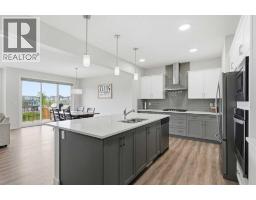 Living room - 15 Lawrence Green Se, Airdrie, AB T4A3M9 Photo 6
