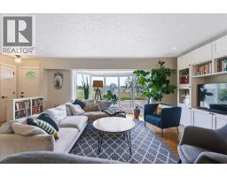 Living room - 103 Grafton Drive Sw, Calgary, AB T3E4W4 Photo 7