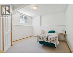 223 Rocky Ridge Close Nw, Calgary, AB T3G4X2 Photo 28