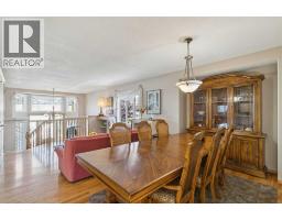 Family room - 223 Rocky Ridge Close Nw, Calgary, AB T3G4X2 Photo 7
