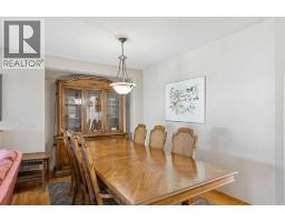 Laundry room - 223 Rocky Ridge Close Nw, Calgary, AB T3G4X2 Photo 8