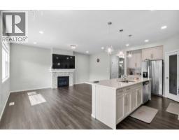 Living room - 243 Savanna Lane Ne, Calgary, AB T3J0Y9 Photo 16