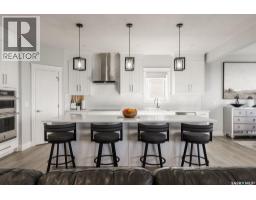 Family room - 411 Sharma Crescent, Saskatoon, SK S7W0Y4 Photo 10