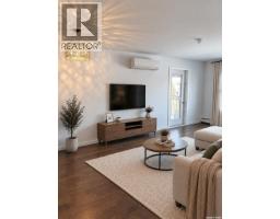 Living room - 211 1545 Neville Drive, Regina, SK S4Z0A7 Photo 7