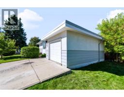 Bedroom - 107 Hallbrook Drive Sw, Calgary, AB T2V3H8 Photo 6