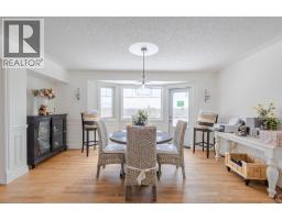 Family room - 260048 Bearspaw Road, Rural Rocky View County, AB T3R1H4 Photo 10