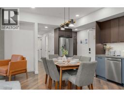Living room - 217, 1730 Bow Valley Trail, Canmore, AB T1W2X3 Photo 9