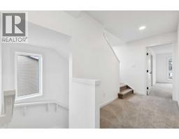 69 Bluerock Hill Sw, Calgary, AB T2Y0V7 Photo 16