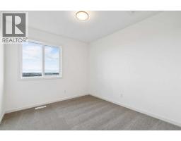 69 Bluerock Hill Sw, Calgary, AB T2Y0V7 Photo 17