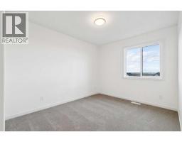 69 Bluerock Hill Sw, Calgary, AB T2Y0V7 Photo 18
