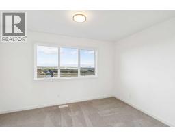 69 Bluerock Hill Sw, Calgary, AB T2Y0V7 Photo 30