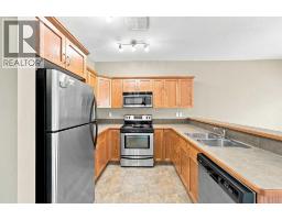 Bedroom - 115, 50 Lucky Place, Sylvan Lake, AB T4S0E3 Photo 6