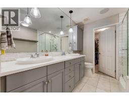 Laundry room - 218 Springbank Villas Sw, Calgary, AB T3H5P7 Photo 14