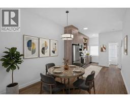 Bedroom - 202, 101 Panatella Square Nw, Calgary, AB T3K2R9 Photo 6