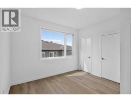 202, 101 Panatella Square Nw, Calgary, AB T3K2R9 Photo 16