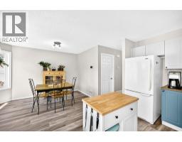 2pc Bathroom - 79 Hidden Hills Way Nw, Calgary, AB T3A5Y3 Photo 13