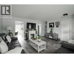 Living room - 114 Hilltop Crescent, Fort Mcmurray, AB T9H3V4 Photo 6
