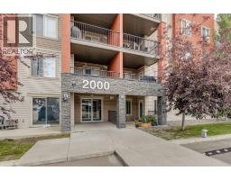 2117, 403 Mackenzie Way SW - photo 2