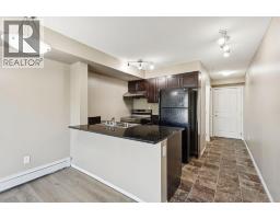 2117, 403 Mackenzie Way SW - photo 14
