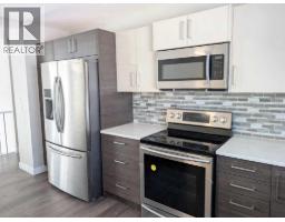 Living room - 5972 Madigan Drive Ne, Calgary, AB T2A5A3 Photo 9