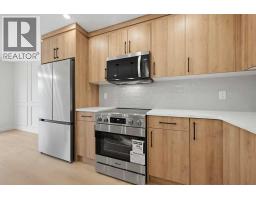 Kitchen - 1387 Berkley Drive Nw, Calgary, AB T3K1T5 Photo 10