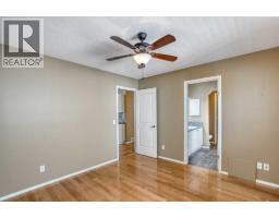 Primary Bedroom - 22 Glensummit Close, Cochrane, AB T4C2J9 Photo 7