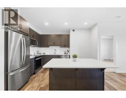 Bedroom - 301, 55 Wolf Hollow Crescent Se, Calgary, AB T2X5K9 Photo 6