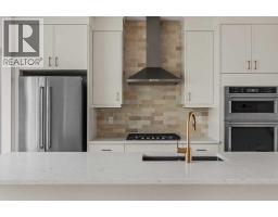 Laundry room - 212 Sovereign Common Sw, Calgary, AB T3C3Y3 Photo 12