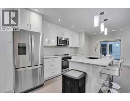 Bedroom - 207, 20 Brentwood Common Nw, Calgary, AB T2L2L7 Photo 9