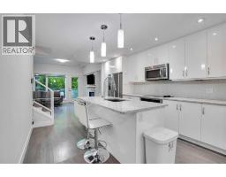 Bedroom - 207, 20 Brentwood Common Nw, Calgary, AB T2L2L7 Photo 8