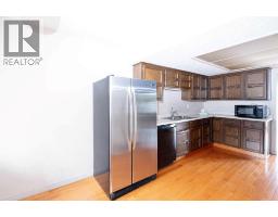 Bedroom - 30, 228 Theodore Place Nw, Calgary, AB T2K5S1 Photo 10