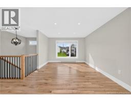 Living room - 28 De La Colline Street, Dieppe, NB E1A6N3 Photo 8